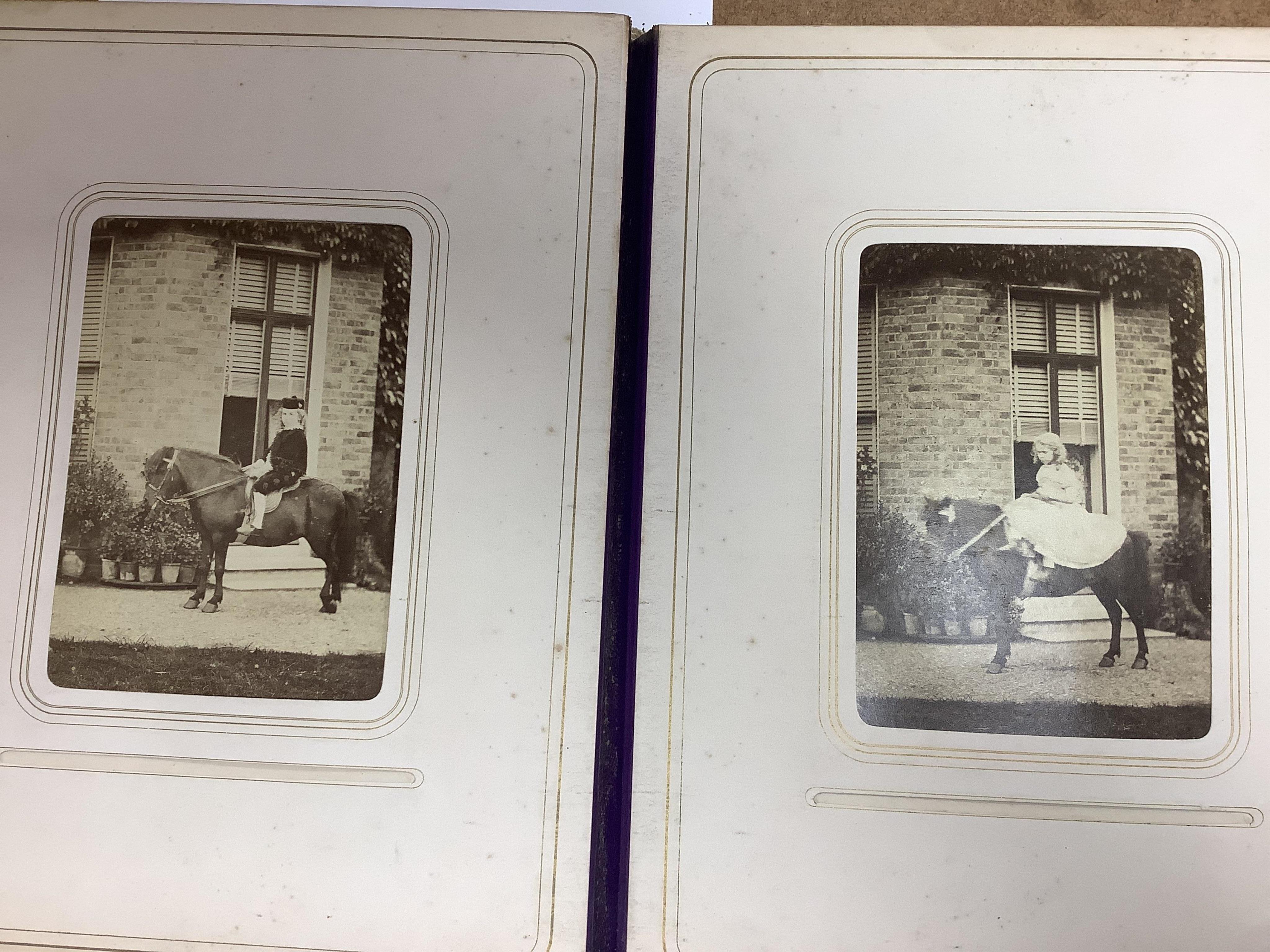 A Victorian malachite mounted amboyna family photograph album, 23cm x 30cm